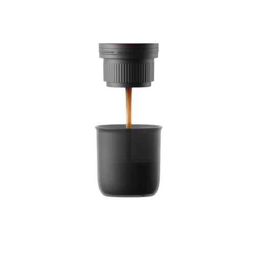 cafetera espresso y capsulas nesspreso blanca