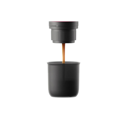 cafetera espresso y capsulas nesspreso blanca